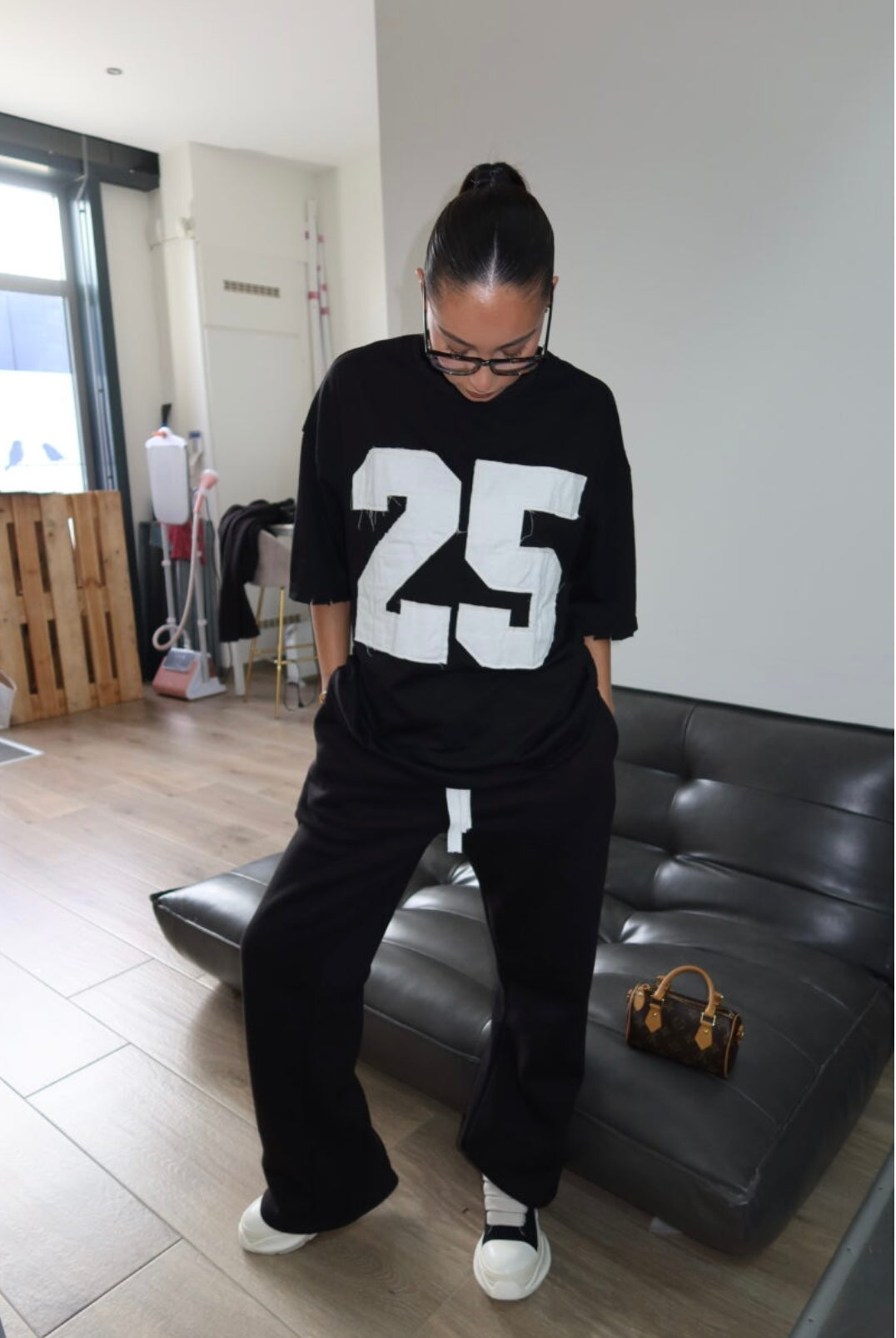 PRIORITY 25 ICONIC TEE – BLACK