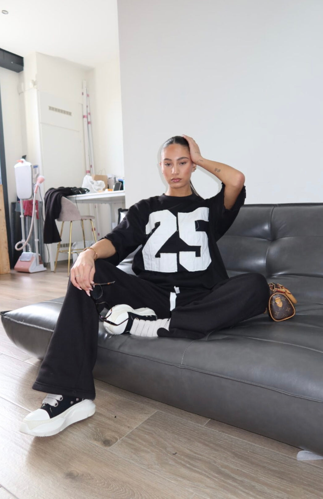 PRIORITY 25 ICONIC TEE – BLACK