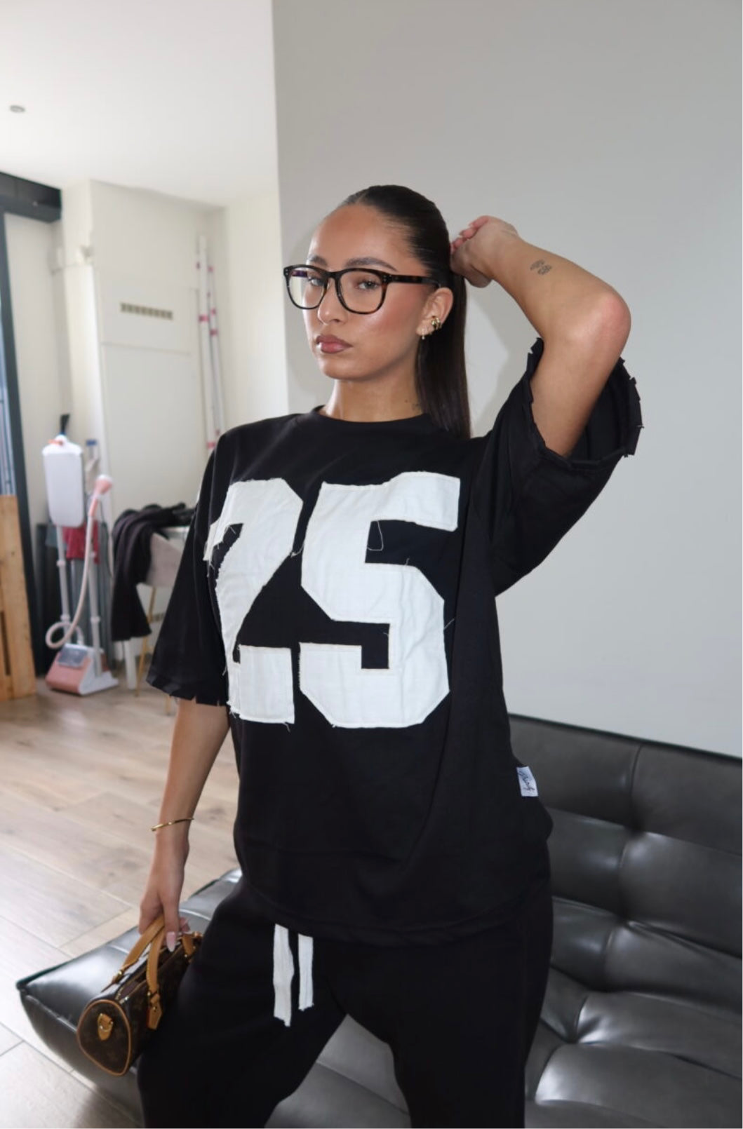 PRIORITY 25 ICONIC TEE – BLACK