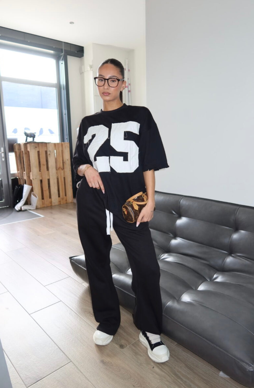 PRIORITY 25 ICONIC TEE – BLACK